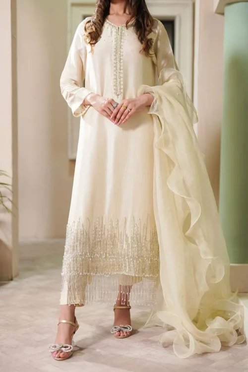 Ivory pearl silk suit with hand-embellished Korean silk shirt and organza dupatta by Hammad Impressions luxury Pakistani party wear