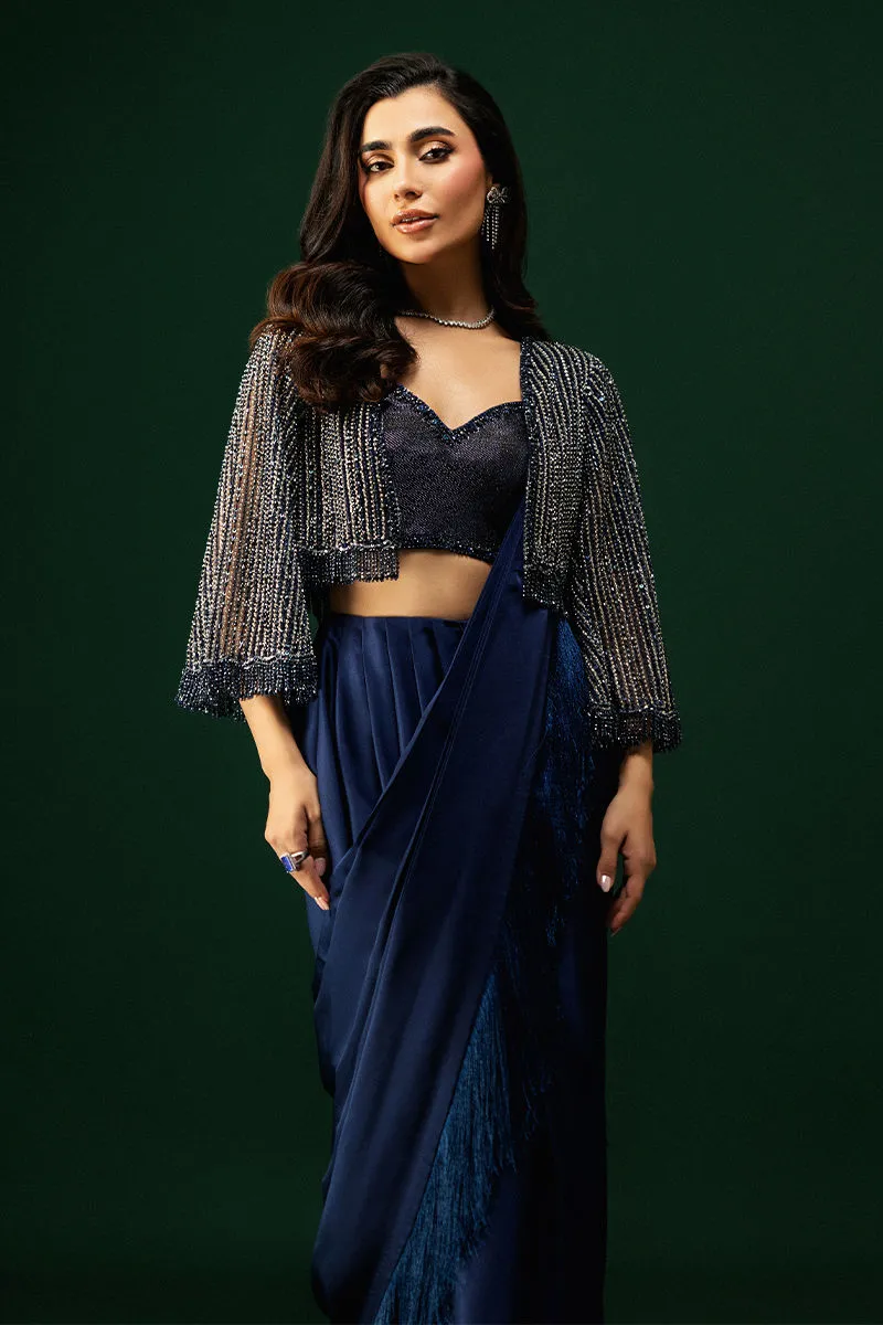 Luxury Tissue Silk Saree – 30% off, Sparkling Crystal Jacket Close-up of Tissue Silk Saree blouse with metallic fabric and handwork detailing.