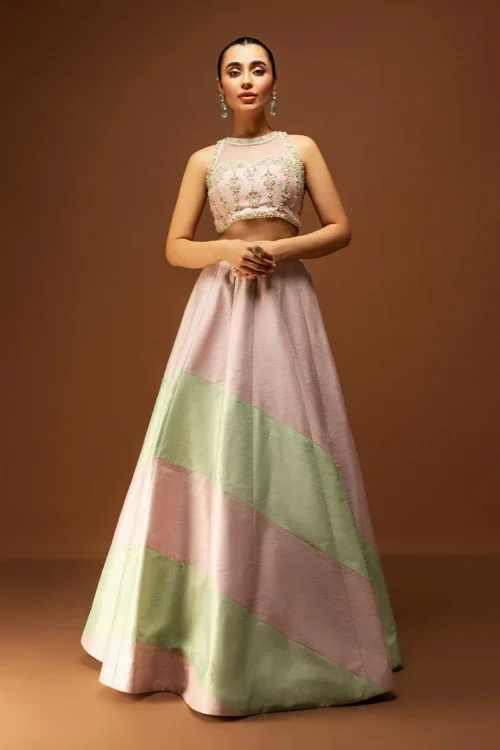 Bridal Lehenga Choli in rich pista color, paired with a beaded choli for added glamour.