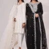 Modern model in white dress stands alongside a model in the Inaya black and white raw silk set, both showcasing elegant designs for weddings and formal events.