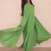 Don’t Miss Out – Apple Green Dress in Luxe Raw Silk Elegance "Apple Green Dress back view with handcrafted embellishments, designed for the modern woman seeking a blend of tradition and contemporary style."