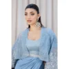 Sky Blue Fusion Saree with Hand-Embellished Cape – Luxury Traditional Wear Close-up of Saree Embroidery "Intricate embroidery on the sky blue fusion saree, showcasing handcrafted craftsmanship with pearl and silver embellishments."