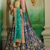 Royal Blue Lehenga Choli – Sheer net sleeves with delicate zardozi embroidery.
