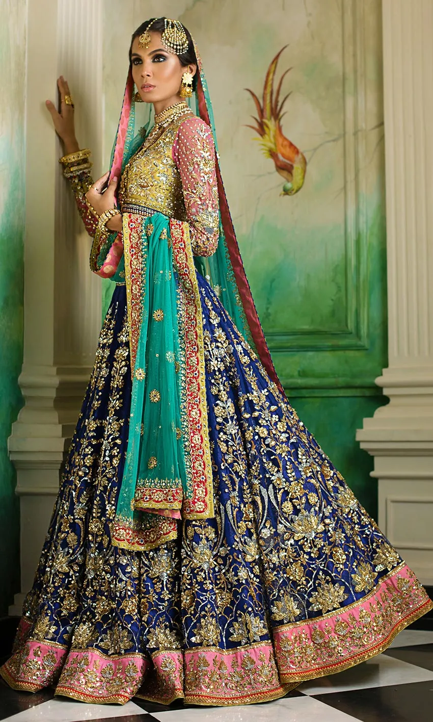 Royal Blue Lehenga Choli – Sheer net sleeves with delicate zardozi embroidery.