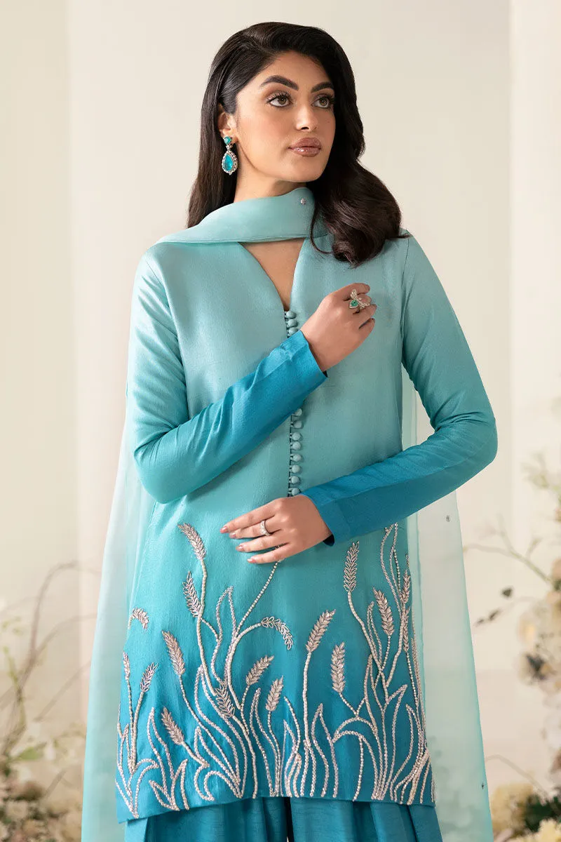 2️⃣ Embroidered Silk Suit for Women Featuring Ombre Turquoise & Silver Dabka Work
