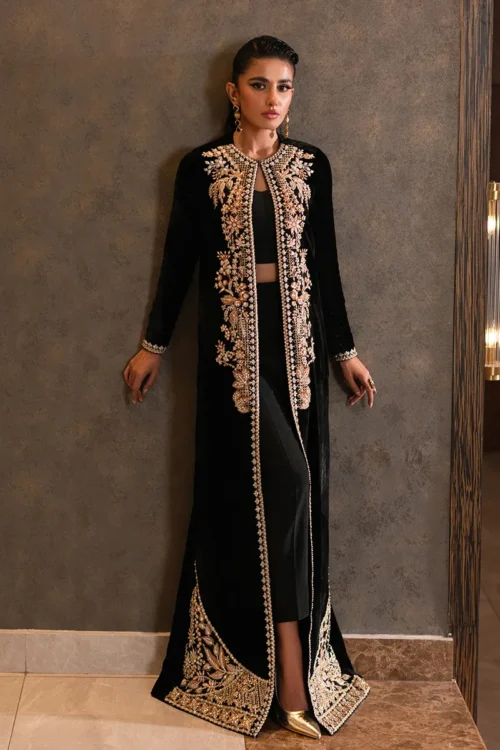 Black velvet jacket with intricate embroidery and vibrant embellishments