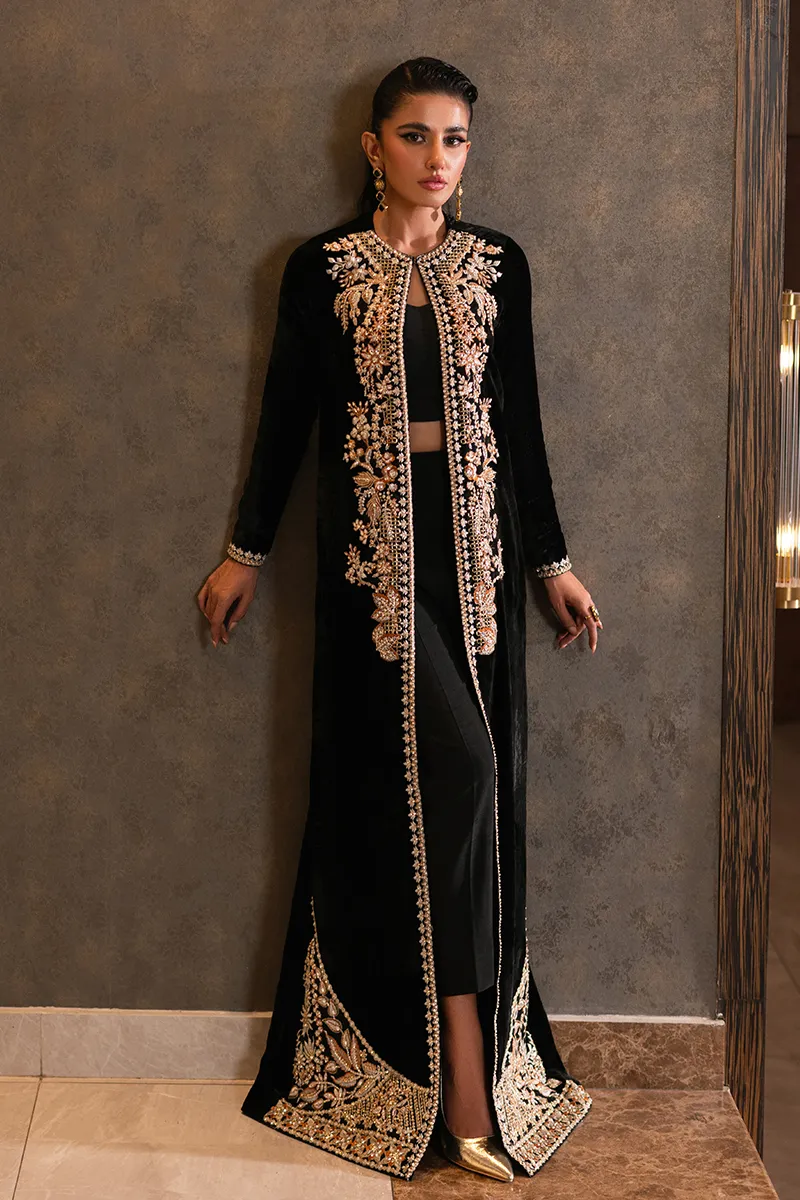 Black velvet jacket with intricate embroidery and vibrant embellishments