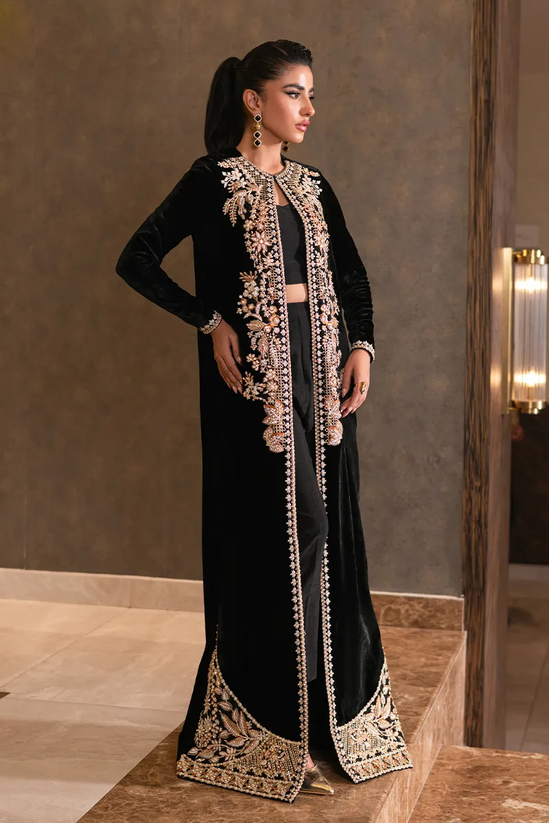 Black velvet jacket with intricate embroidery and vibrant embellishments