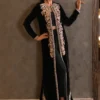 Black velvet jacket with intricate embroidery and vibrant embellishments
