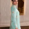 Ice blue velvet shirt with embellished neckline and intricate design