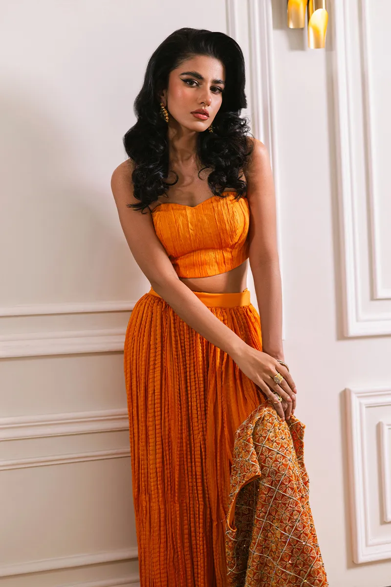 Orange velvet short jacket with intricate embroidery and embellishments