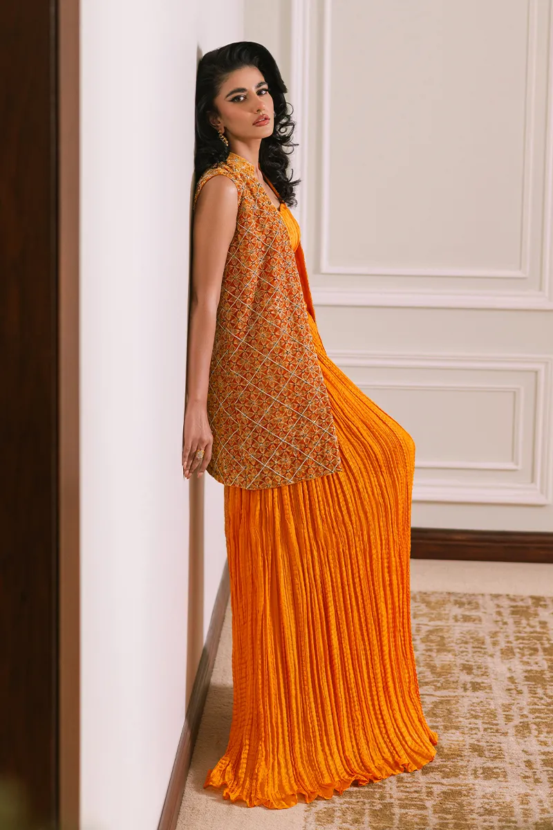 Orange velvet short jacket with intricate embroidery and embellishments
