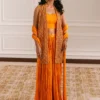 Orange velvet short jacket with intricate embroidery and embellishments