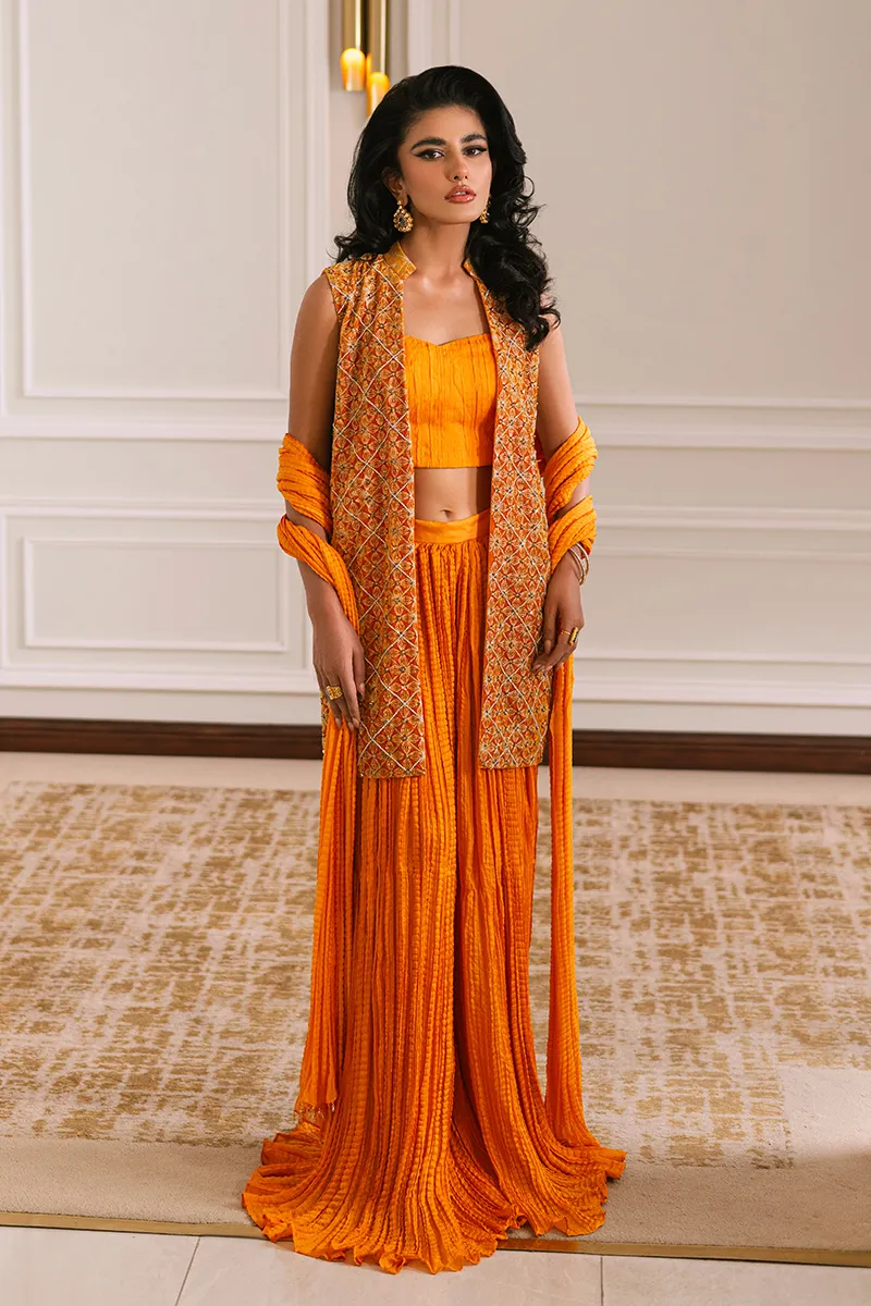 Orange velvet short jacket with intricate embroidery and embellishments