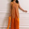 Orange velvet short jacket with intricate embroidery and embellishments