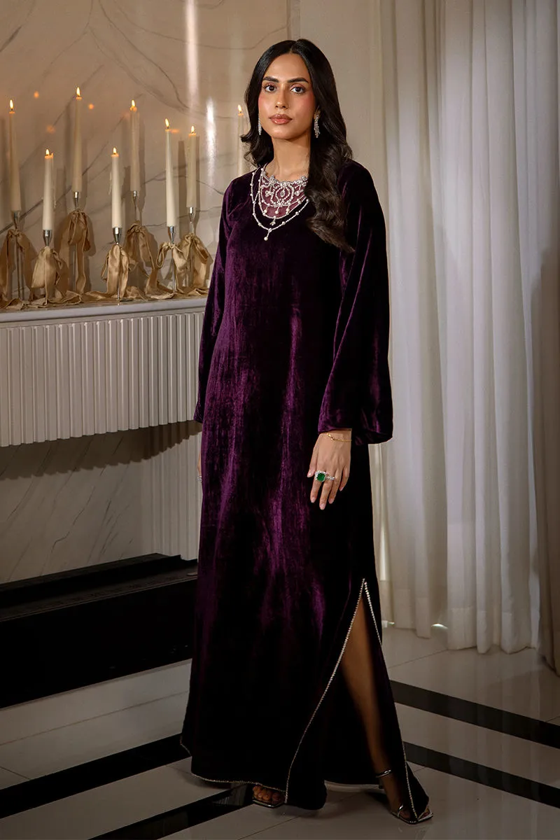 "Elegant velvet dress in royal purple with handcrafted pearl tiki stones"