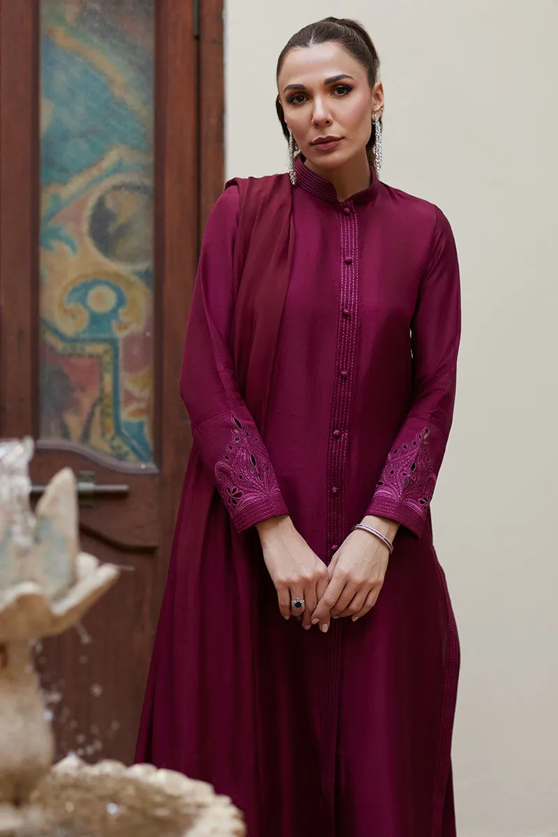 Burgundy Raw Silk Sherwani with intricate running stitch and embroidery for added sophistication.