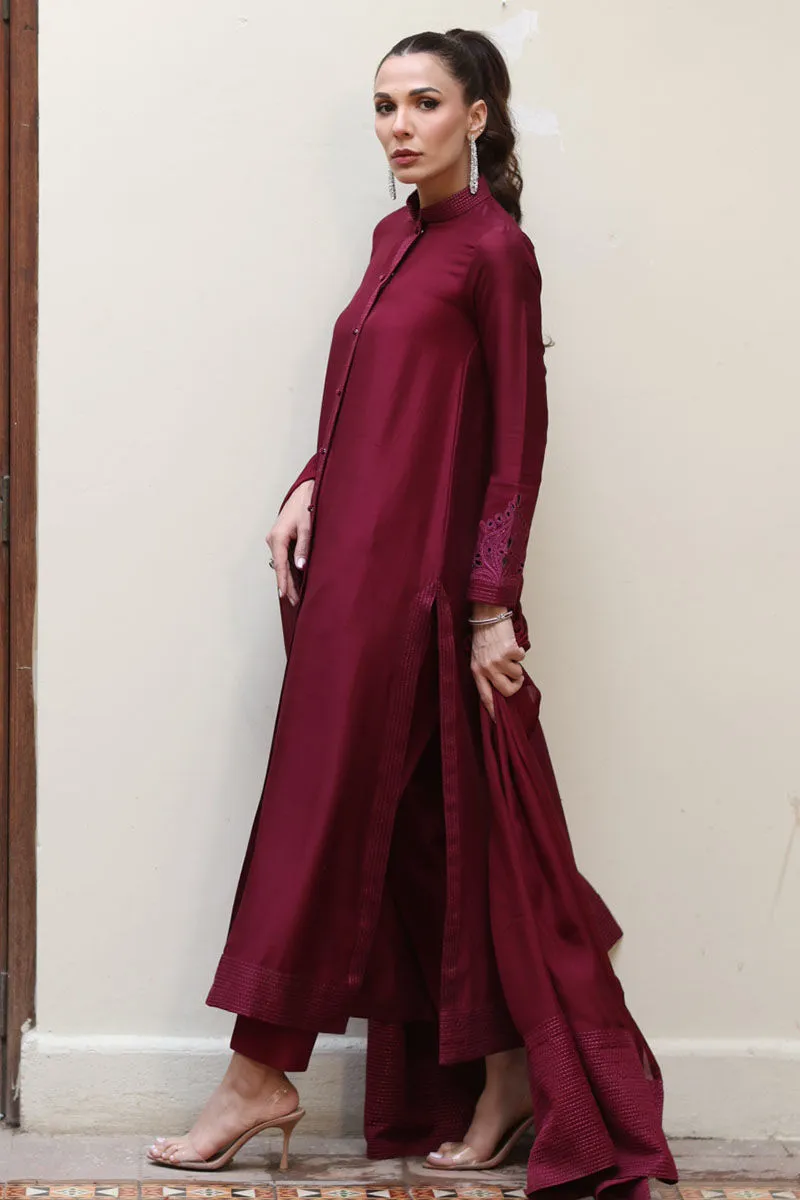 Burgundy Raw Silk Sherwani with intricate running stitch and embroidery for added sophistication.