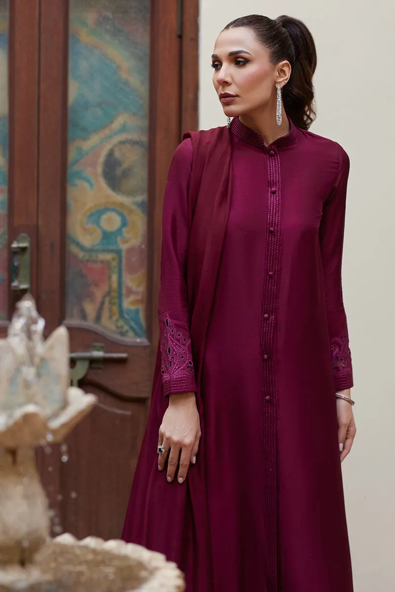 Burgundy Raw Silk Sherwani with intricate running stitch and embroidery for added sophistication.