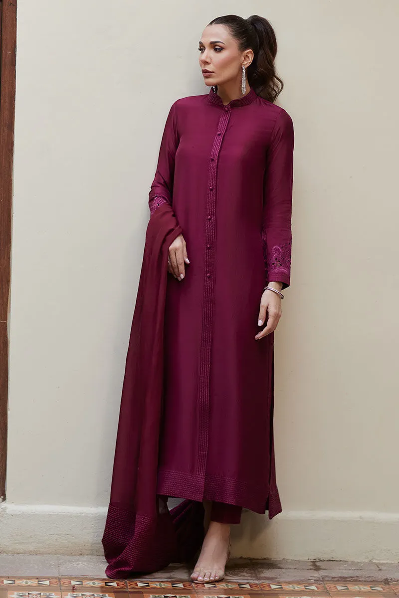 Burgundy Raw Silk Sherwani with intricate running stitch and embroidery for added sophistication.