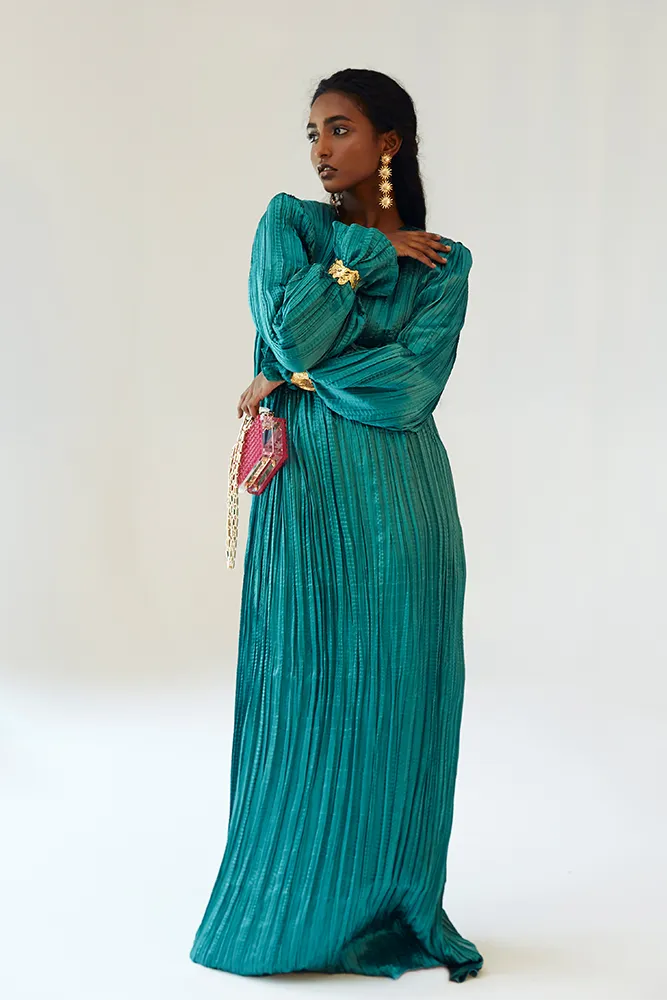 Teal Satin Pleated Gown with Billowing Sleeves and Gold Cuffs
