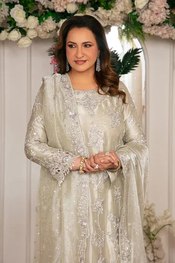 White wedding dress with a fitted bodice and voluminous skirt, adding a royal touch to your big day.