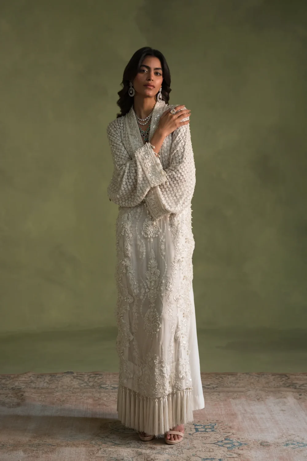 White dress for women nearby with luxurious silk pants