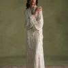 White dress for women nearby with luxurious silk pants