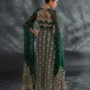 Emerald green dress with a flowing fabric, captured from the back.