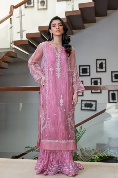 Ivory Organza shirt with handwork and sparkling stones, styled with a crushed inner lehenga Ivory Organza shirt with handwork and sparkling stones, styled with a crushed inner lehenga