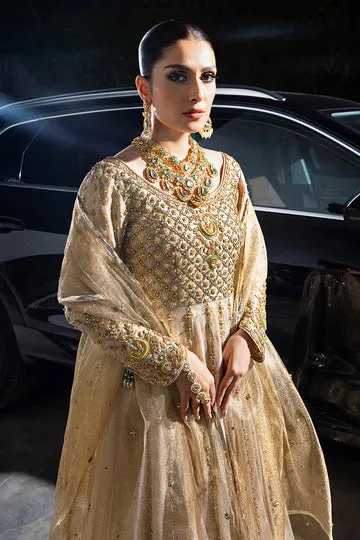 GOLD MASURI NET KALIDAR DRESS with a royal flowy kalidar silhouette.