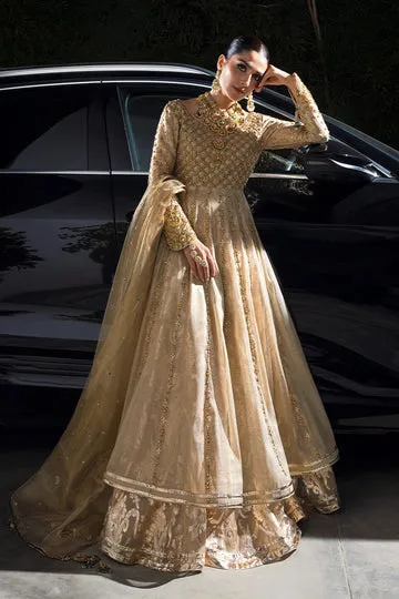 GOLD MASURI NET KALIDAR DRESS shimmering under the lights.