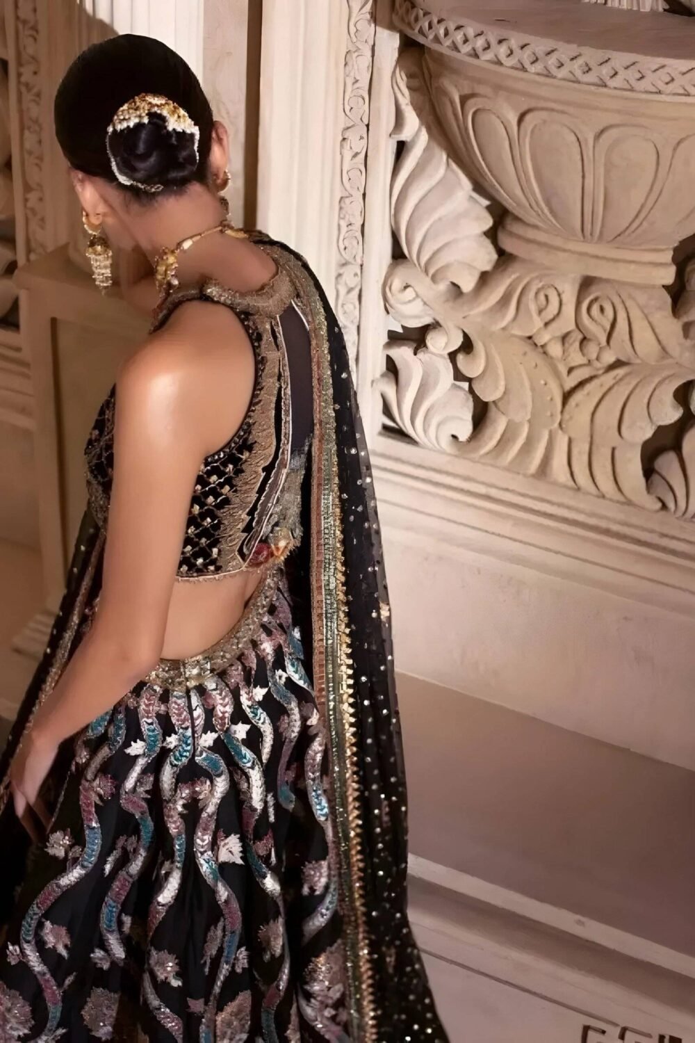 Black Lehenga Choli – with Gold Embroidery and Emerald Stone