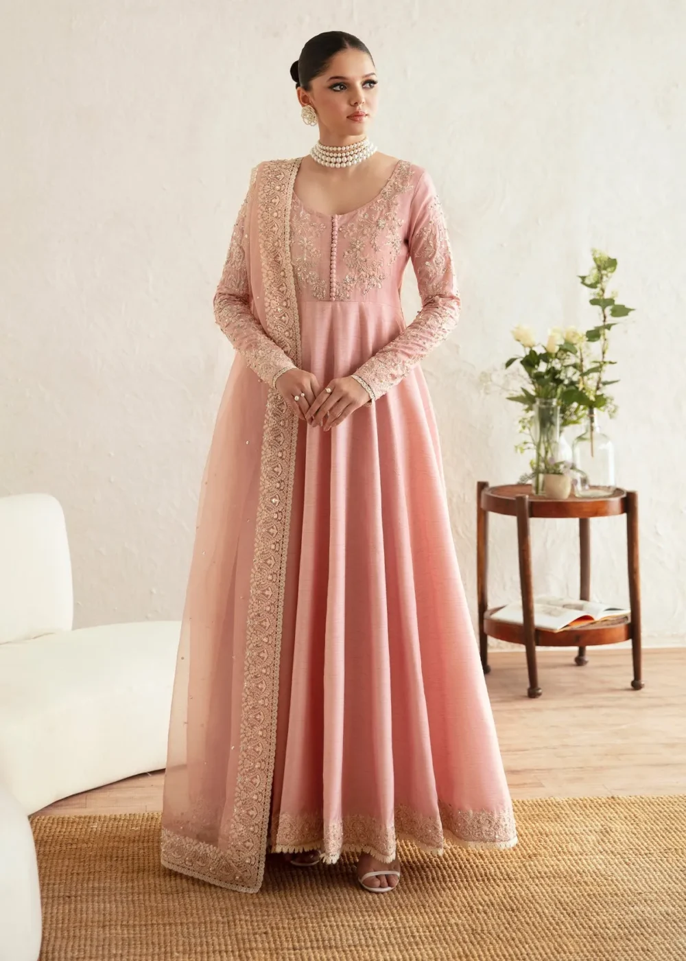 "Blush pink pishwas with intricate embroidery and hand embellishments"