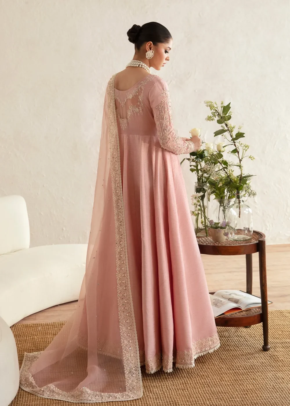 "Blush pink pishwas with intricate embroidery and hand embellishments"