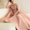 "Blush pink pishwas with intricate embroidery and hand embellishments"