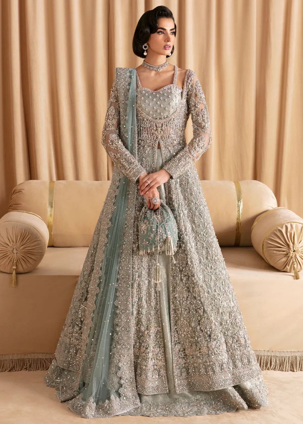 Light Blue Pishwas with Lehenga, showcasing intricate design and voluminous lehenga"