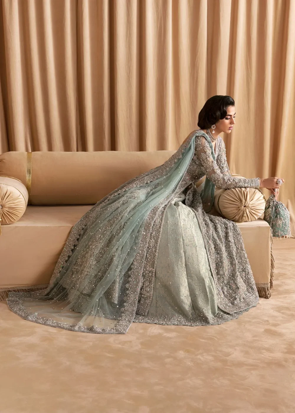 Light Blue Pishwas with Lehenga, showcasing intricate design and voluminous lehenga"
