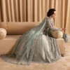 Light Blue Pishwas with Lehenga, showcasing intricate design and voluminous lehenga"