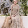 Nude Peshwas ensemble with delicate embroidery and shimmering embellishments
