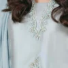 "Sheesha Silk Shirt with Scalloped Neckline Adorned with Pearls and Sequins."