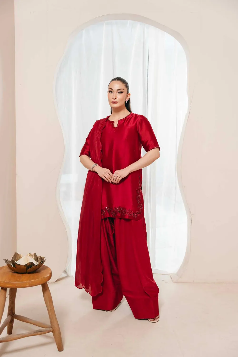 "Red Sheesha Silk Shirt with Crystal and Bead Embellishments on Keyhole Neckline."