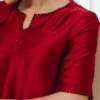 "Red Sheesha Silk Shirt with Crystal and Bead Embellishments on Keyhole Neckline."