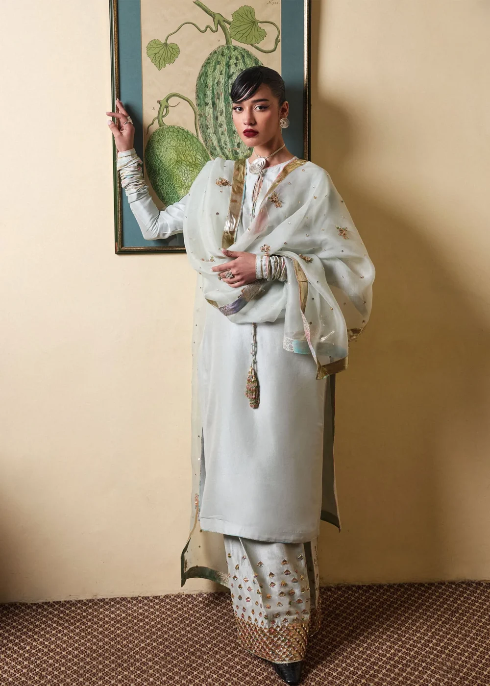"Ice Blue Long Shirt with Choridar Sleeves and Intricate Embellishments"