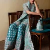"Ice Blue Organza Shirt & Teal Silk Shalwar with Hand-Embellished Details and Puff Sleeves"