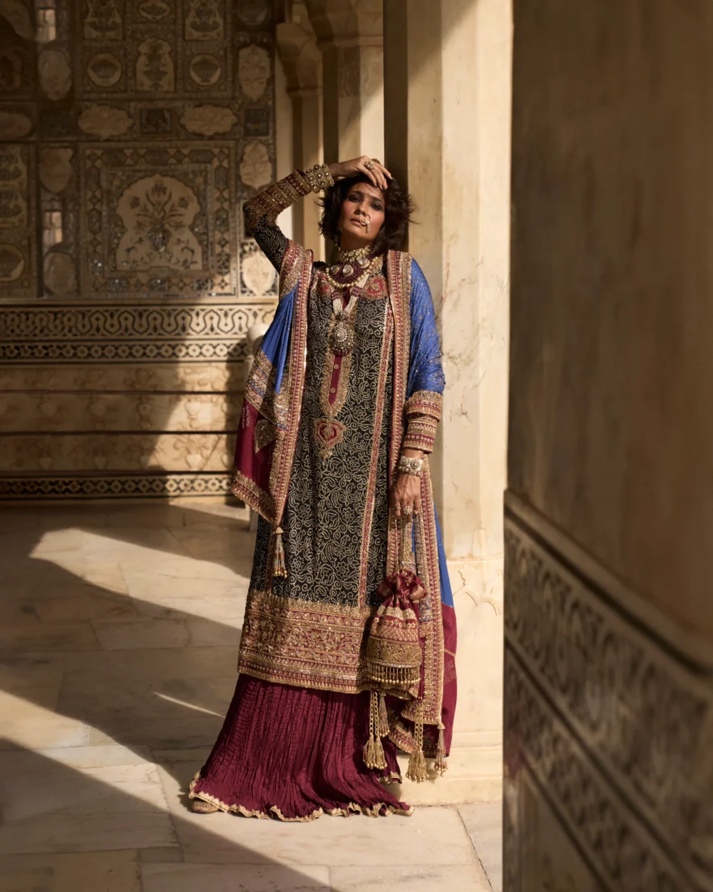 The Black Charmeuse Chunri Lehenga Set is highlighted with its exquisite craftsmanship and luxurious fabric. The Black Charmeuse Chunri Lehenga Set is highlighted with its exquisite craftsmanship and luxurious fabric.