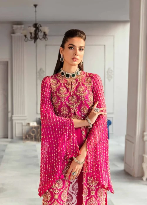 "Shocking pink chiffon shirt with hand embellishments and draped sleeves"