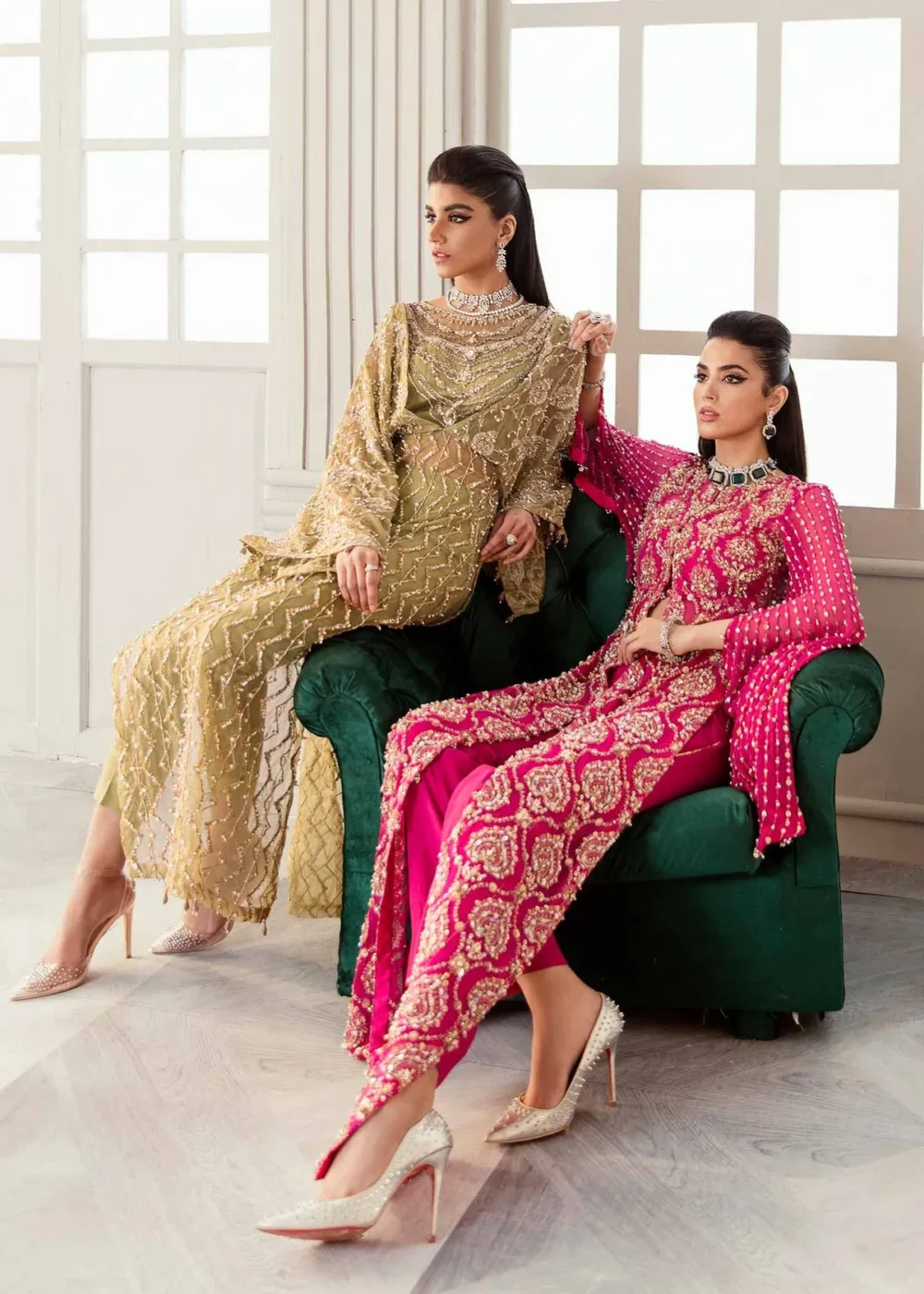 "Shocking pink chiffon shirt with hand embellishments and draped sleeves"