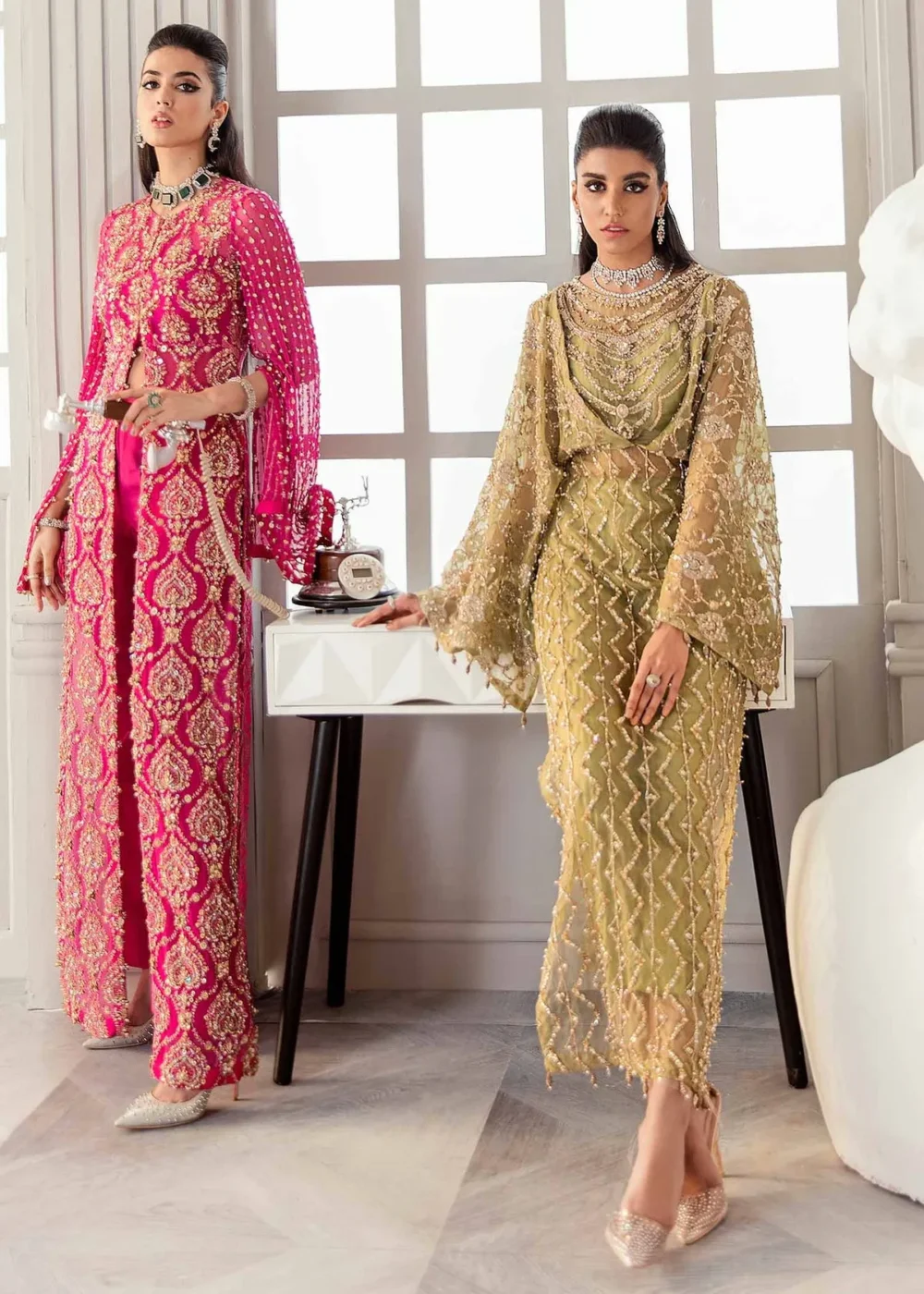 "Shocking pink chiffon shirt with hand embellishments and draped sleeves"