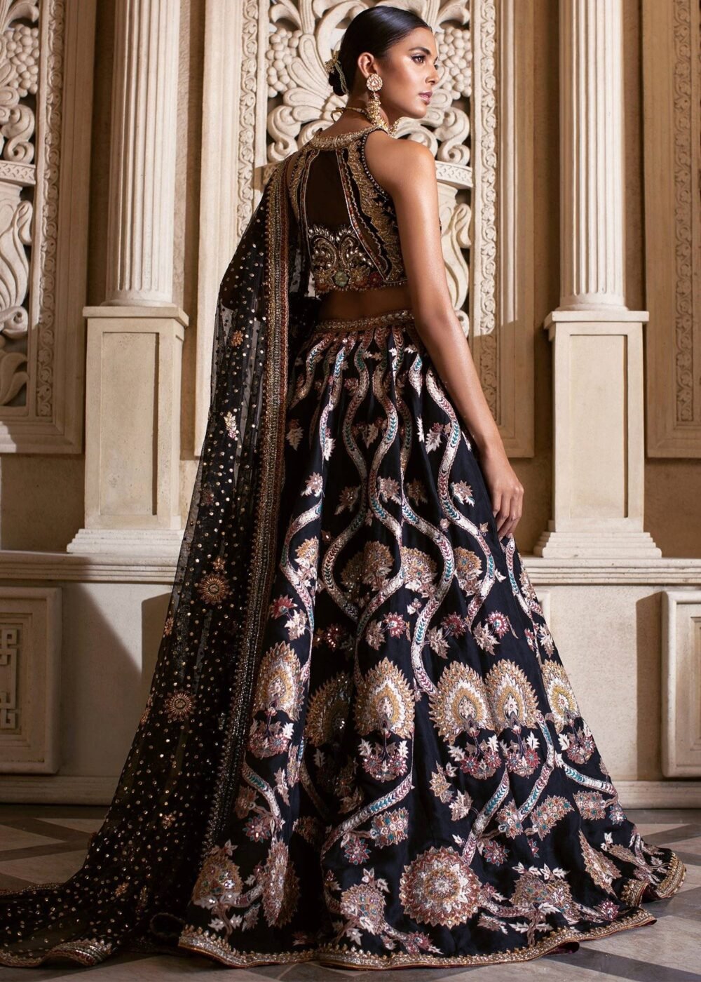 Black Lehenga Choli – with Gold Embroidery and Emerald Stone